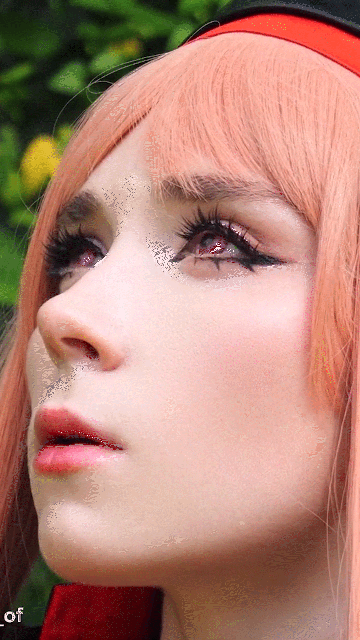 close-up of a girl in cosplay looking up